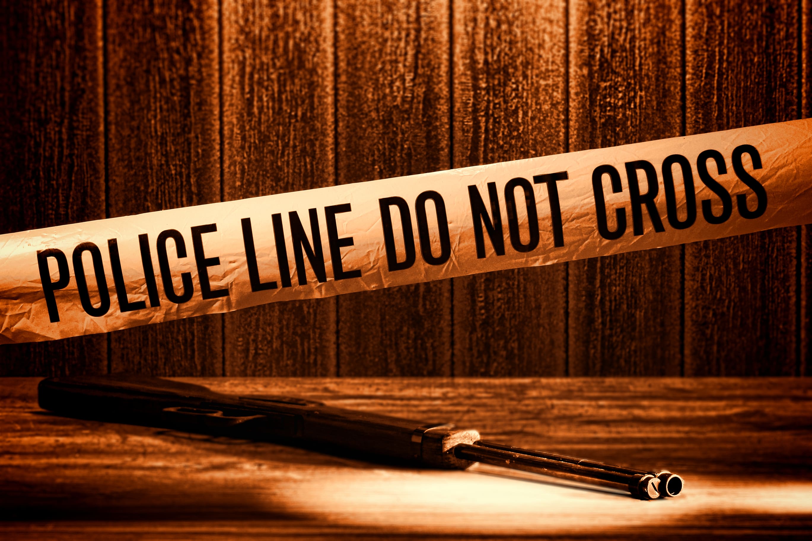 General photo of a "police line do not cross" sign.
